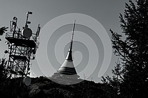 View of a mountain hotel and a television transmitter